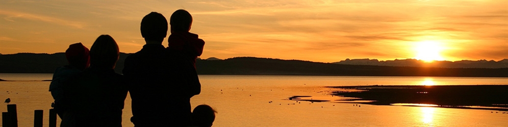 Family viewing sunset over Puget Sound